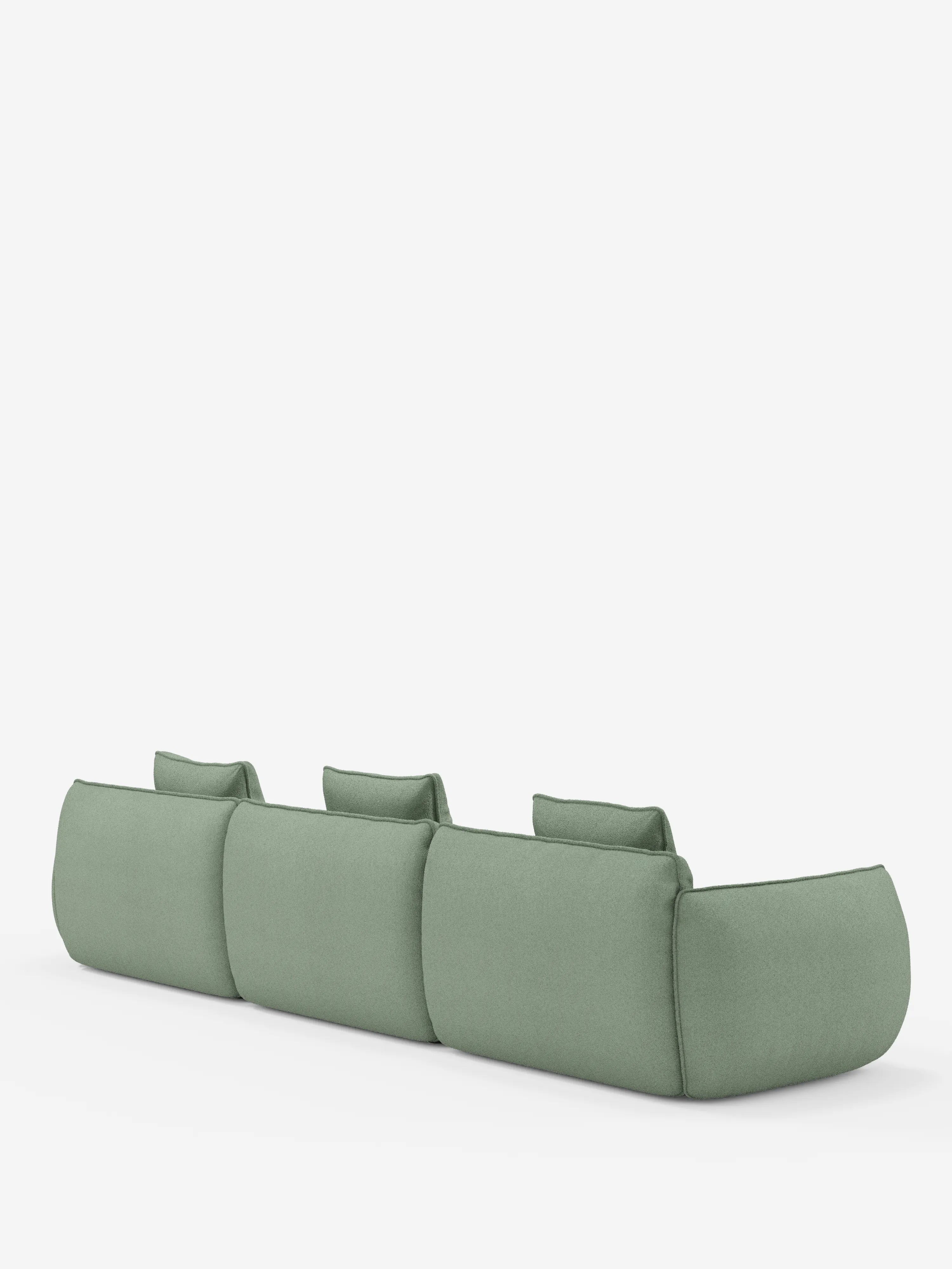 Un divano verde, minimalista e moderno — il divano angolare con penisola componibile Nimbus di Divani.Store — è ritratto di spalle su uno sfondo bianco a tinta unita. Caratterizzato da tre ampie sedute e da cuscini spessi e arrotondati in morbido tessuto effetto cotone antimacchia (T33), il suo design semplice si distingue per il profilo ribassato e gli schienali a cuscino di ogni seduta, incarnando l’elegante comfort dei divani modulari contemporanei.