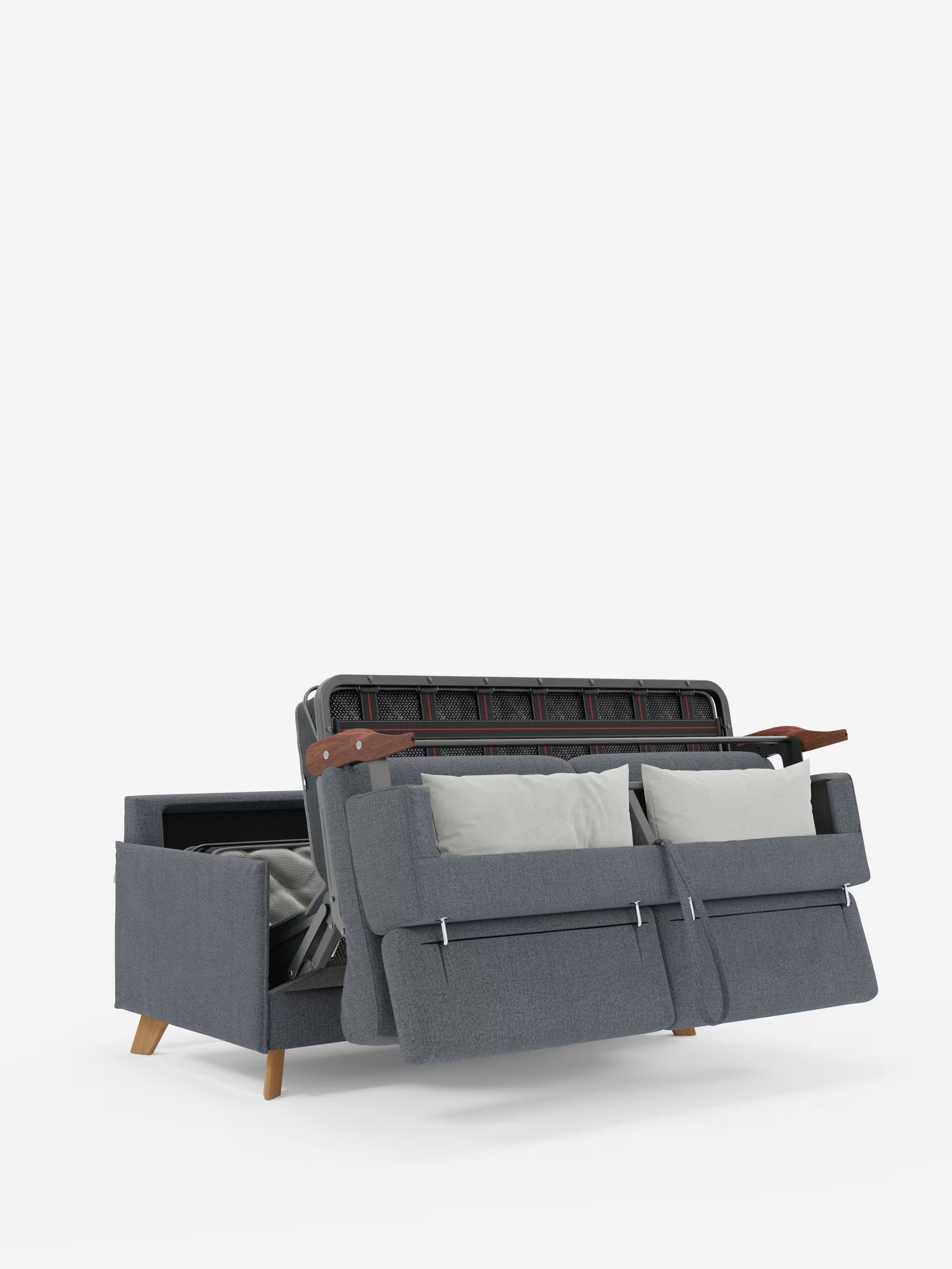 Il divano letto matrimoniale Sole di Divani.Store è un divano letto moderno e compatto di colore grigio con gambe in legno, qui raffigurato parzialmente aperto in modalità letto. Lo schienale e la seduta si estendono in avanti per rivelare il meccanismo di trasformazione, mentre due cuscini grigio chiaro poggiano sulla seduta. L'immagine è inquadrata su uno sfondo bianco a tinta unita.