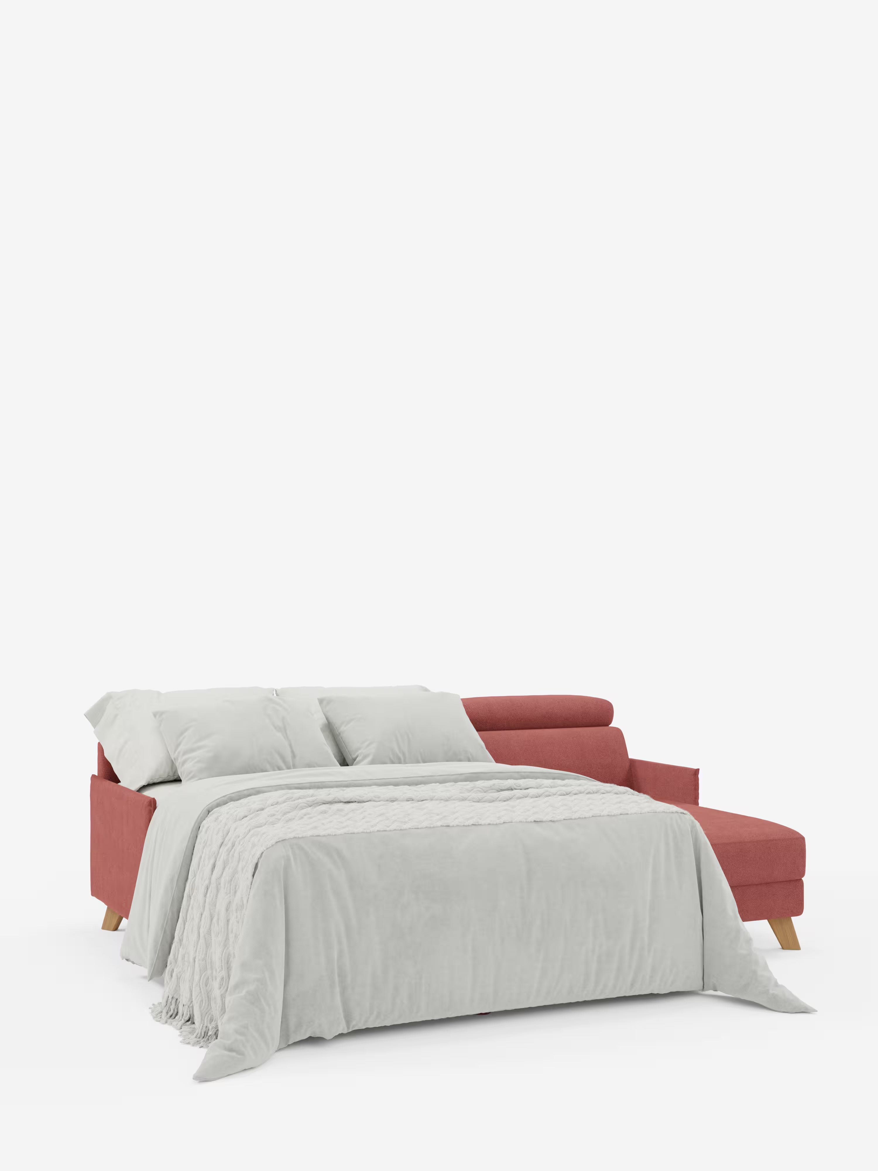 Esclusivo divano letto matrimoniale angolare con penisola contenitore e poggiatesta reclinabili di Divani.Store, rivestito in tessuto antimacchia T23 e disponibile in una tonalità di grigio chiaro con due cuscini coordinati. La chaise longue si trova sul lato destro, mentre lo sfondo bianco mette in risalto il design moderno del mobile.