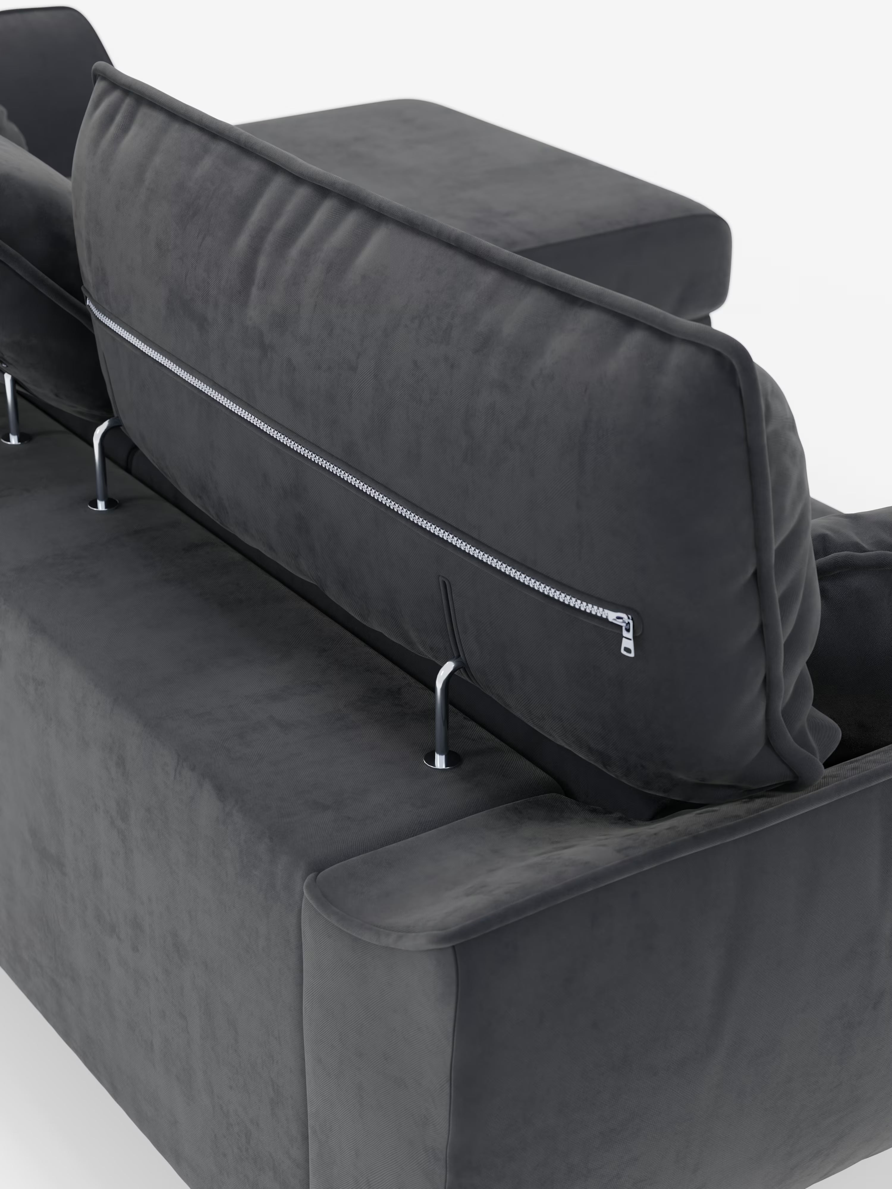Un primo piano del divano angolare con penisola e sedute estensibili “Michelangelo” di Divani.Store mette in risalto il suo rivestimento in tessuto T30 grigio scuro smacchiabile effetto vellutino, caratterizzato da una seduta morbida, braccioli leggermente rialzati ed eleganti dettagli di design come il poggiatesta reclinabile e gli elementi di sostegno metallici a vista. Il look moderno e la zona relax personalizzabile lo rendono un elemento centrale ideale per qualsiasi soggiorno.