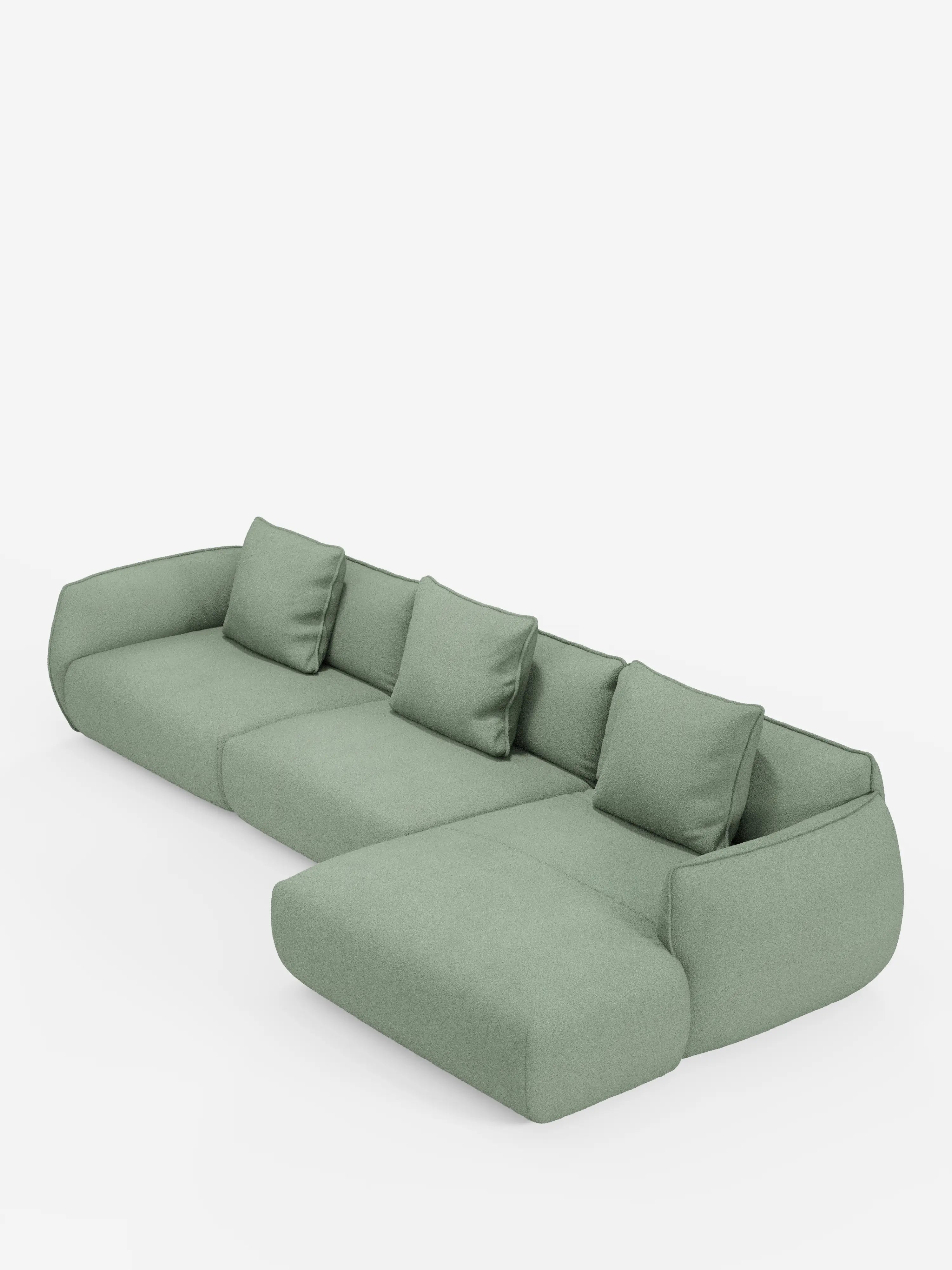 Un divano angolare Nimbus moderno, di colore verde chiaro, con penisola componibile, realizzato in morbido tessuto effetto cotone lavabile T33 di Divani.Store, caratterizzato da quattro cuscini quadrati per lo schienale e da una chaise longue allungata sulla destra, su uno sfondo bianco a tinta unita. Questo divano contemporaneo presenta bordi arrotondati e linee pulite e dal profilo basso.