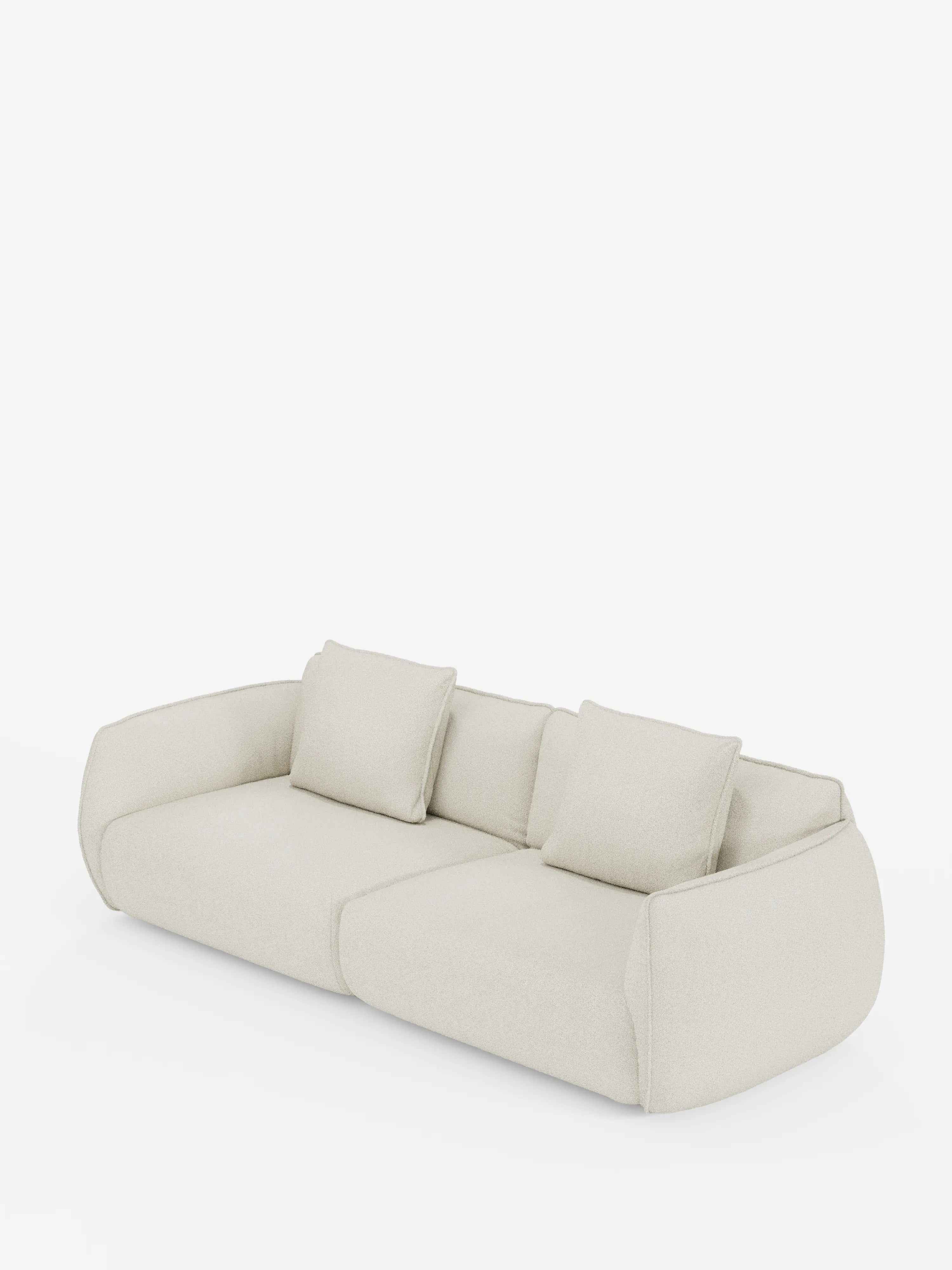 Un divano a 3 posti Nimbus dal design contemporaneo e minimalista, modulare e componibile, firmato Divani.Store, realizzato in tessuto T33 color crema con effetto cotone e resistente alle macchie, caratterizzato da morbidi bordi arrotondati, schienali bassi e due grandi cuscini quadrati abbinati. Il design morbido e accogliente risalta su uno sfondo bianco a tinta unita.