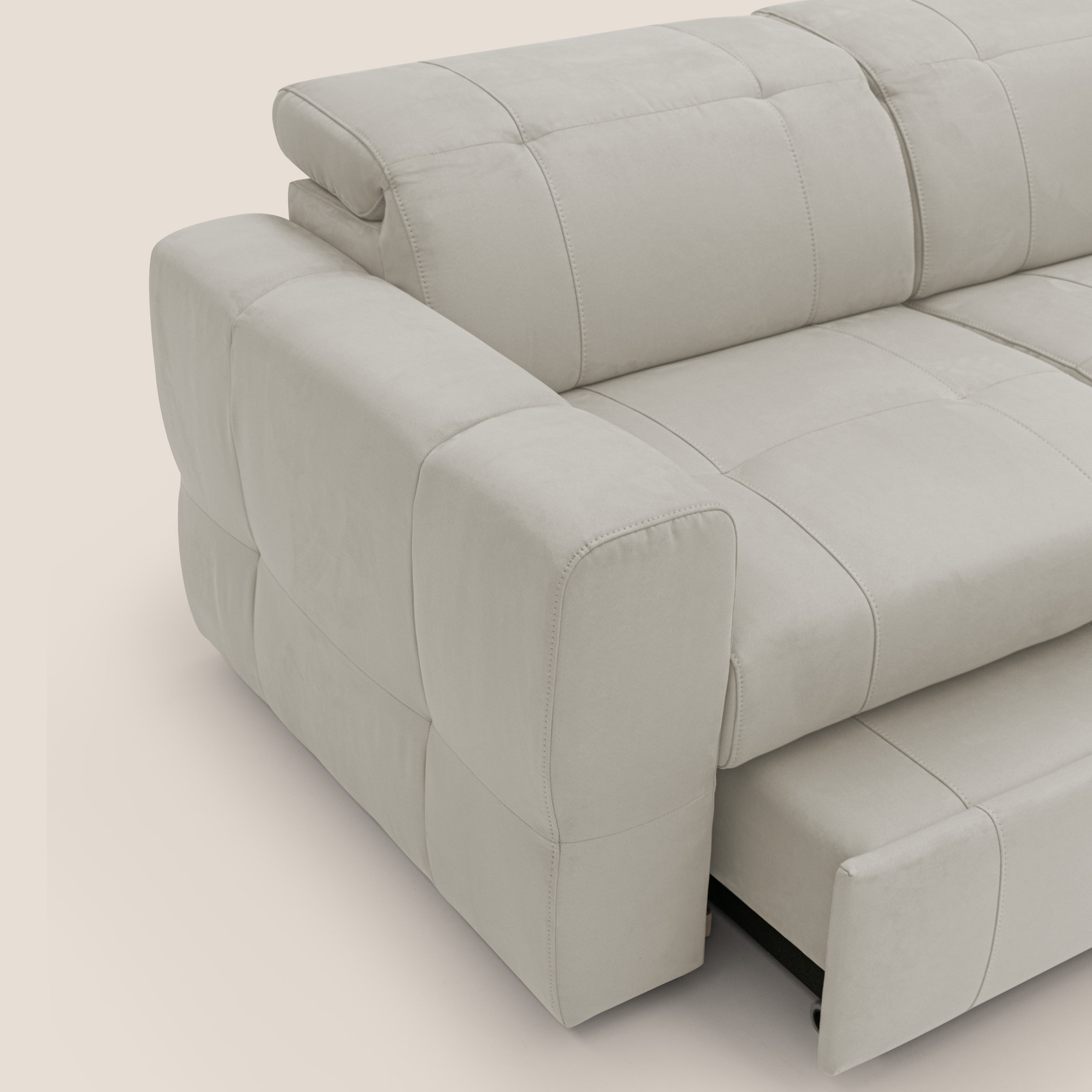 Kronos Divano angolare con pouf estraibile e penisola contenitore in microfibra impermeabile T11 panna - divani.store