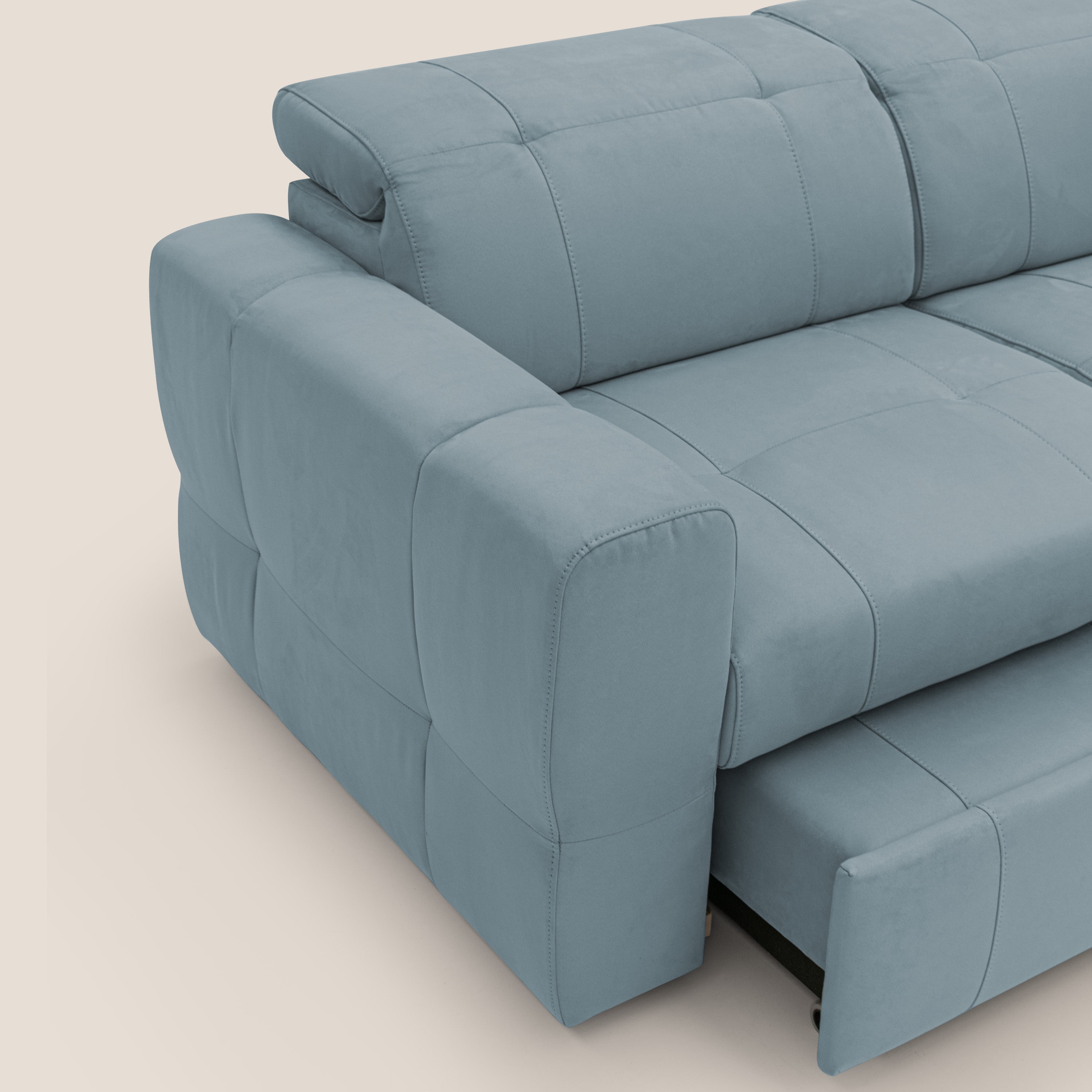 Kronos Divano angolare con poggiapiedi estraibile e pouf contenitore mobile in microfibra impermeabile T11 carta da zucchero - divani.store