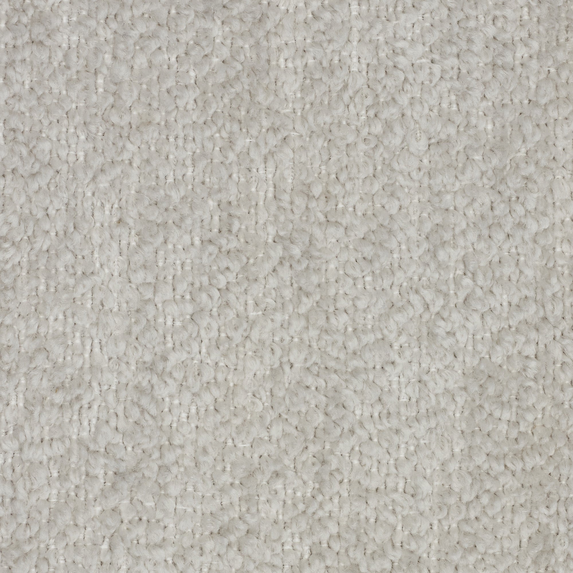 Primo piano di Personalizzazione in T21 di Divani.Store: un tappeto beige chiaro a pelo ritorto, caratterizzato da fibre ben compattate per una superficie morbida e uniforme, con sottili variazioni di tonalità dovute alla sua trama.