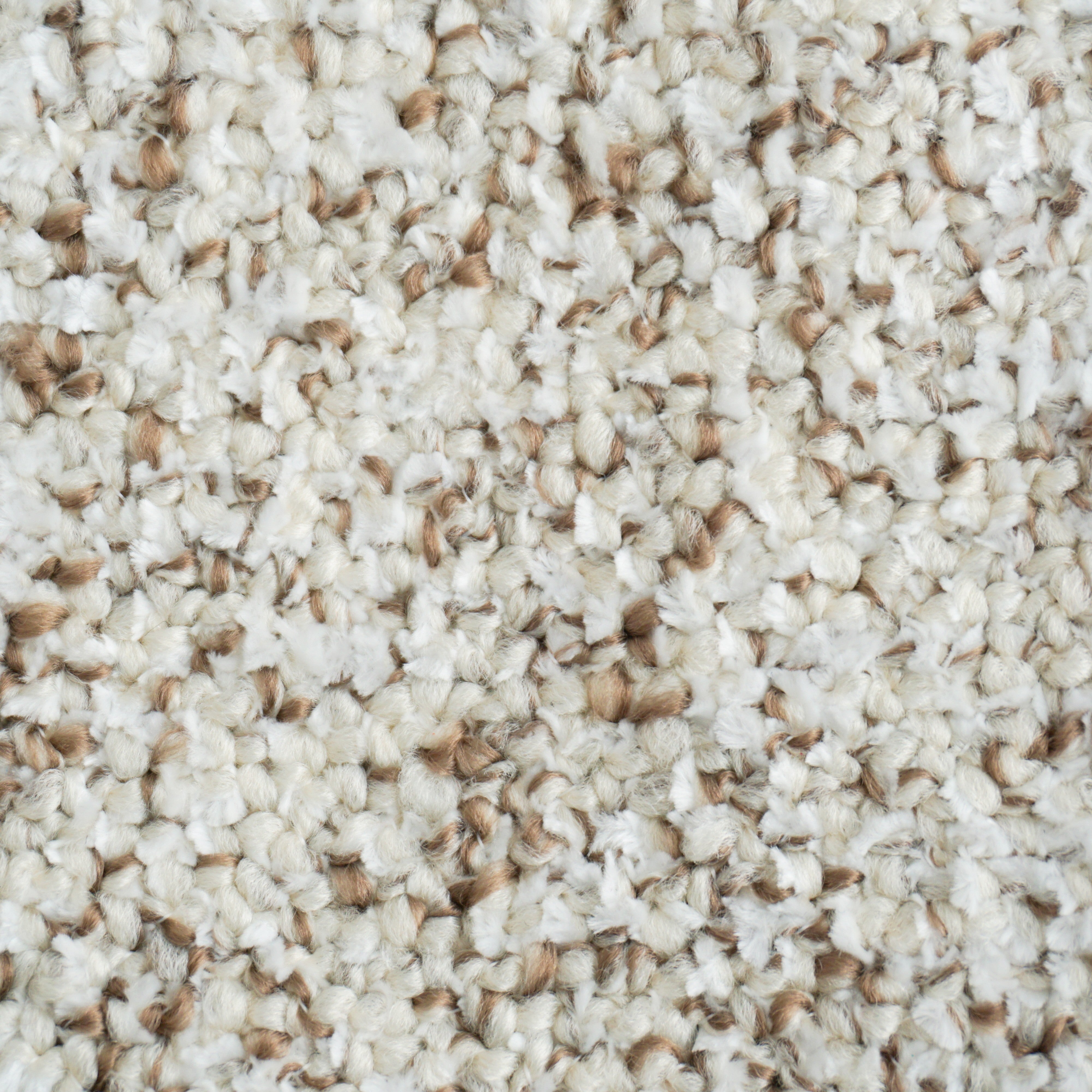 Primo piano di Personalizzazione in T29 di Divani.Store, caratterizzato da fibre a maglia nei colori beige, crema e marrone. Il motivo maculato aggiunge calore e comfort a qualsiasi spazio grazie alla sua texture morbida e spessa.