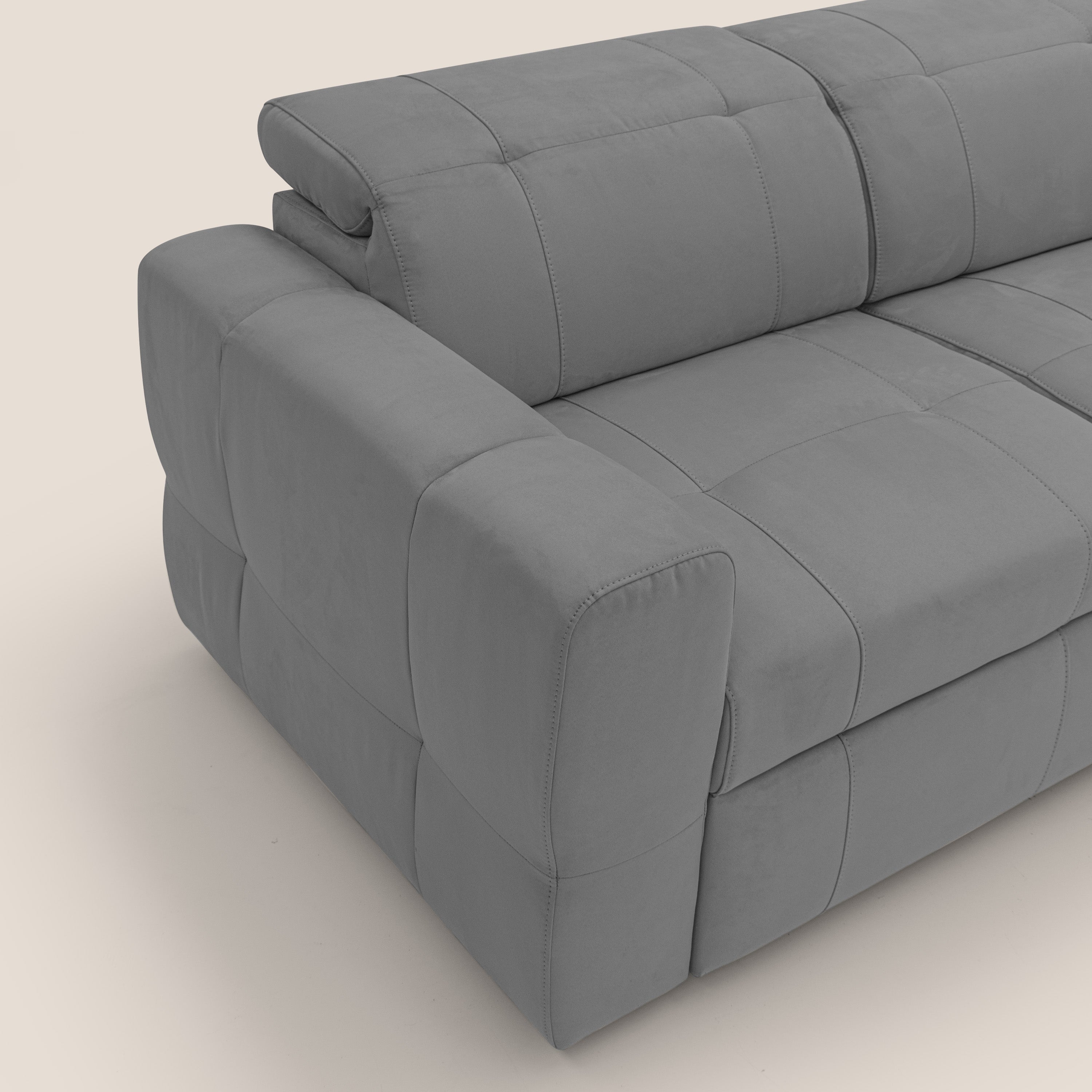 Kronos Divano angolare con poggiapiedi estraibile e pouf contenitore mobile in microfibra impermeabile T11 grigio - divani.store