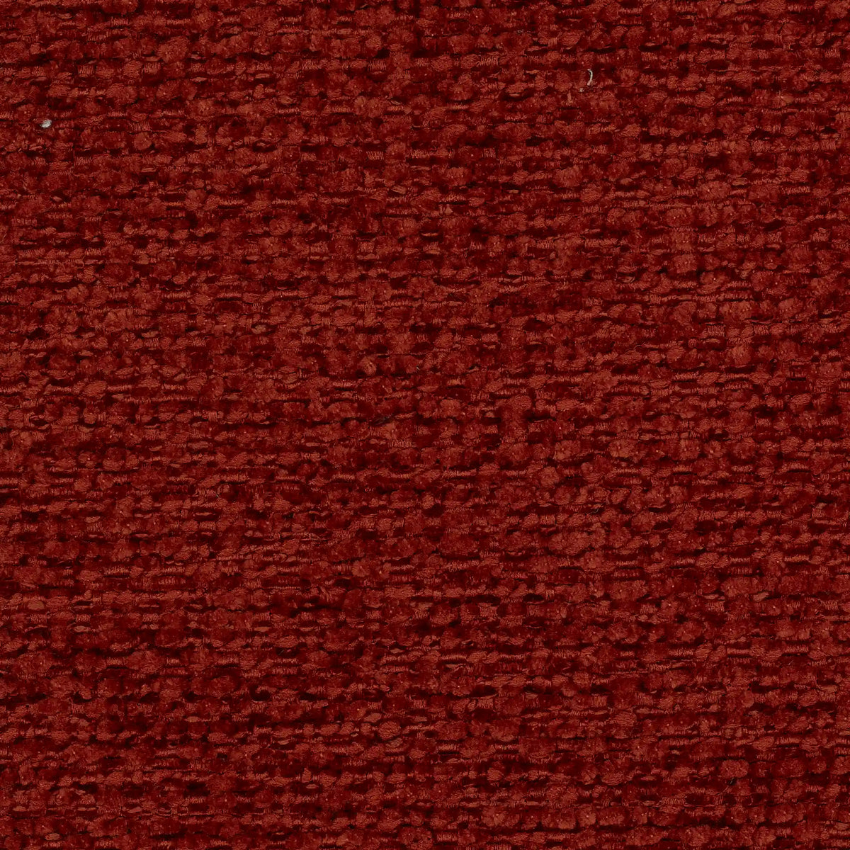 Un primo piano del tessuto dalla trama spessa, di colore rosso scuro intenso, utilizzato per la personalizzazione del modello T38 BILLO, caratterizzato da una trama rustica e granulosa che conferisce al tessuto un aspetto piacevole al tatto.