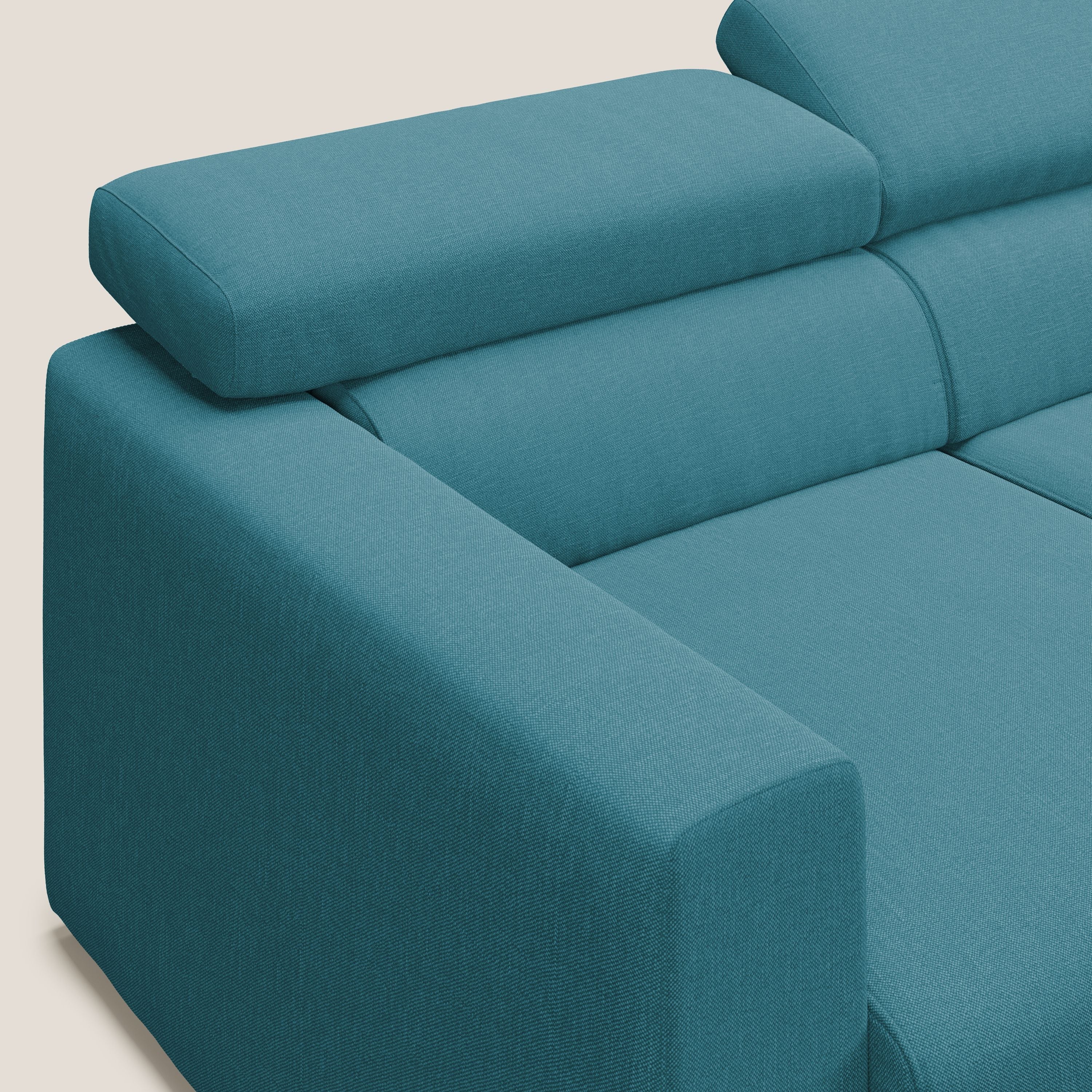 Dylan divano angolare con pouf estraibile poggiapiedi in tessuto simil cotone impermeabile T13 azzurro - divani.store