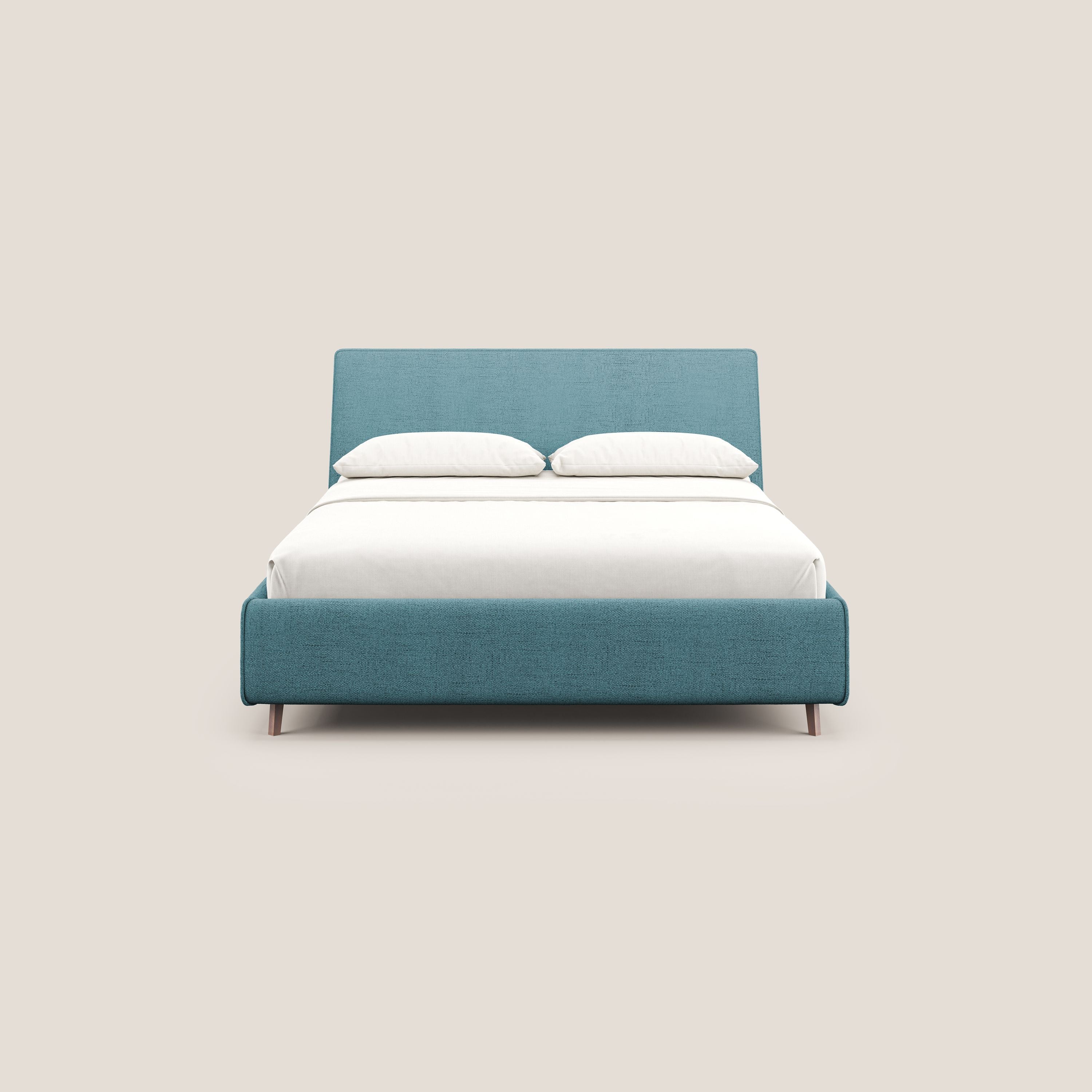 Justin letto imbottito contenitore e sfoderabile in tessuto fiammato impermeabile T03 azzurro - divani.store