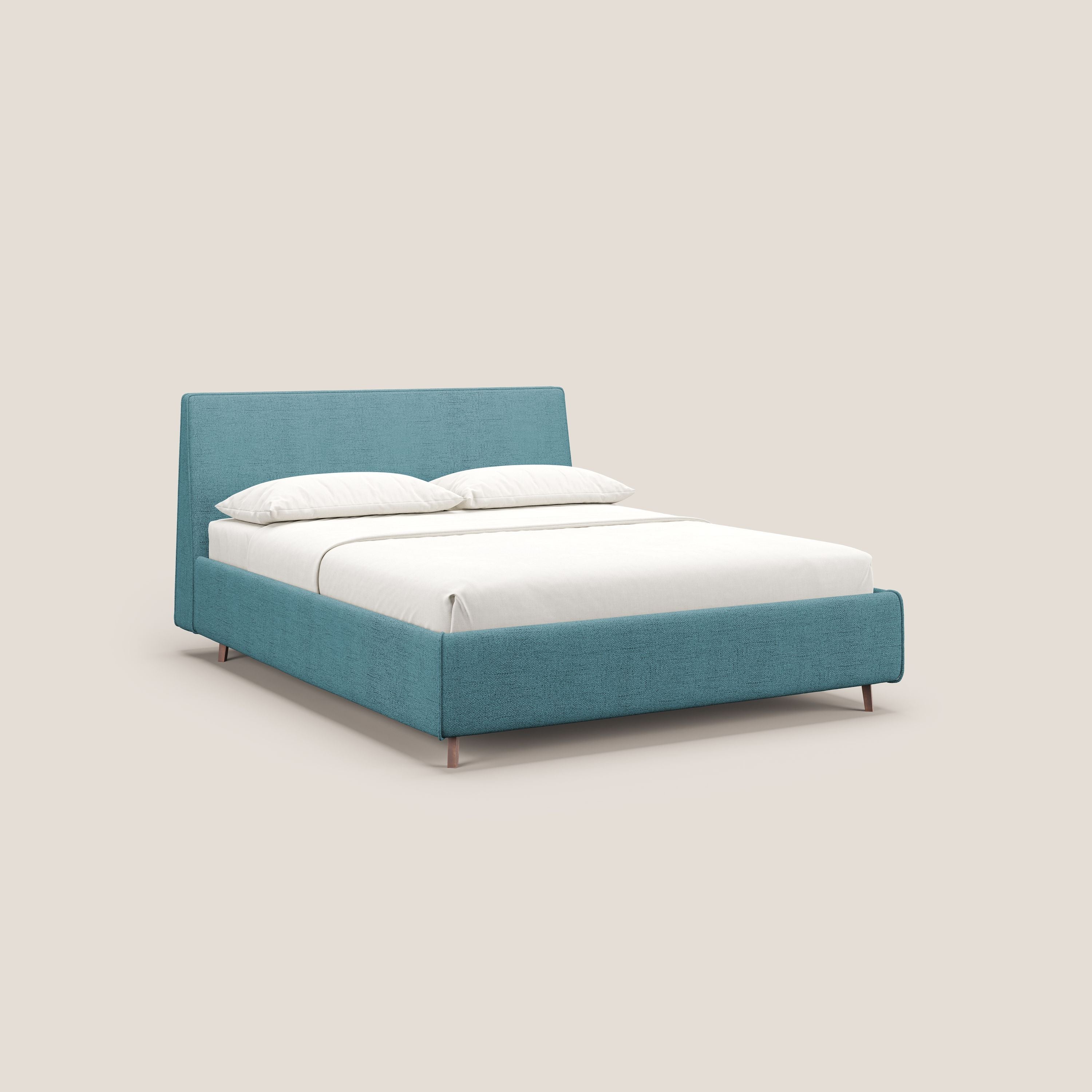 Justin letto imbottito contenitore e sfoderabile in tessuto fiammato impermeabile T03 azzurro - divani.store