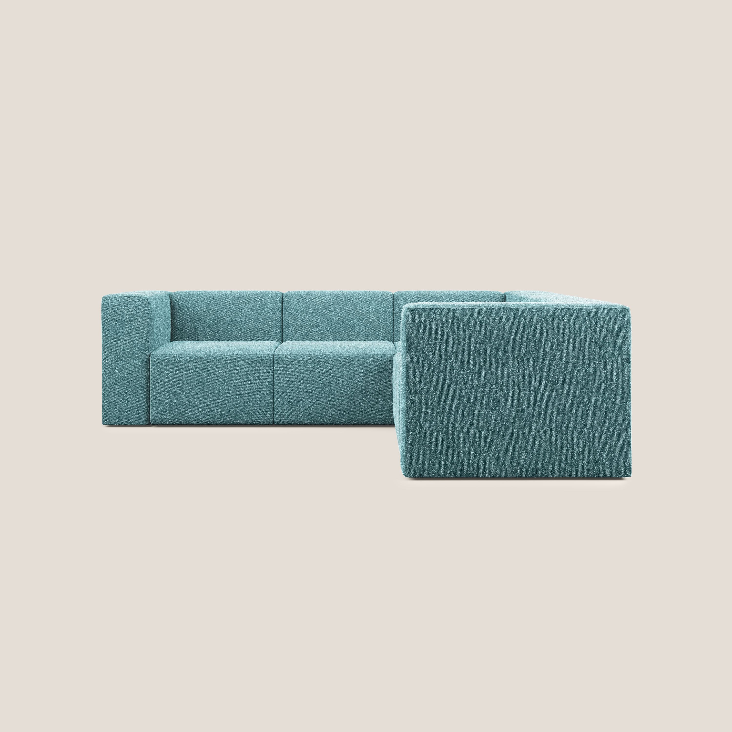 Nettuno divano angolare componibile reversibile in morbido tessuto bouclè T07 azzurro - divani.store