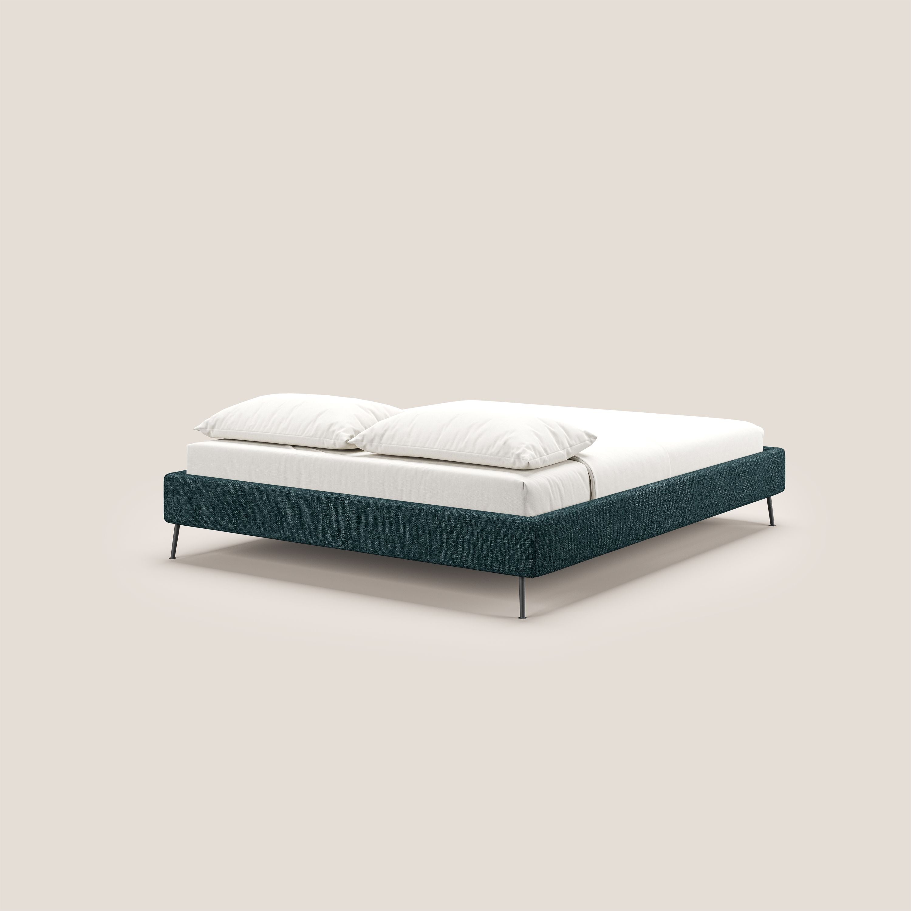 Steve sommier giroletto piedi alti in tessuto impermeabile T10 petrolio - divani.store