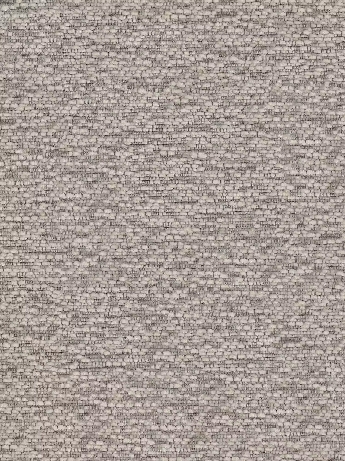 Un primo piano di un muro in pietra grigio chiaro composto da piccoli mattoni rettangolari di dimensioni irregolari, disposti in modo compatto secondo uno schema orizzontale, che creano una texture ruvida — che richiama lo stile contemporaneo e raffinato del “letto imbottito con vano contenitore e morbidi cuscini regolabili ZAYRON” di Letti., caratterizzato da un design moderno e da tessuti certificati Oeko-Tex®. Le fughe di malta tra i mattoni sono sottili e uniformi, conferendo al muro un aspetto