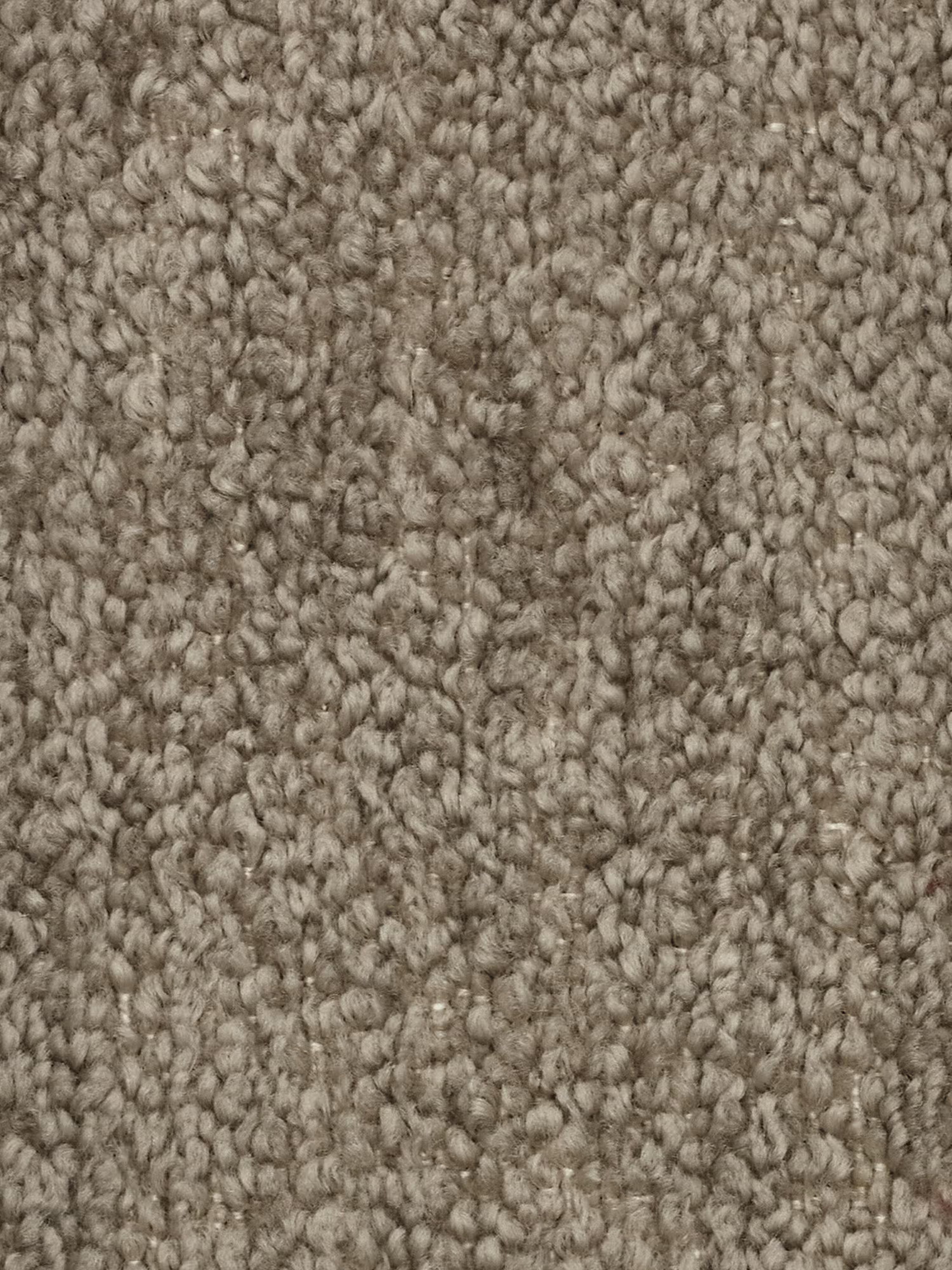 Primo piano del divano angolare componibile e modulare Mosaic in bouclé di Divani.Store, caratterizzato da una trama bouclé fitta e leggermente irregolare nei toni del beige e del marrone chiaro. Il tessuto smacchiabile T21 presenta sottili variazioni cromatiche e un aspetto morbido e soffice, senza macchie o motivi visibili: una superficie uniforme e neutra che mette in risalto il suo design capitonné.