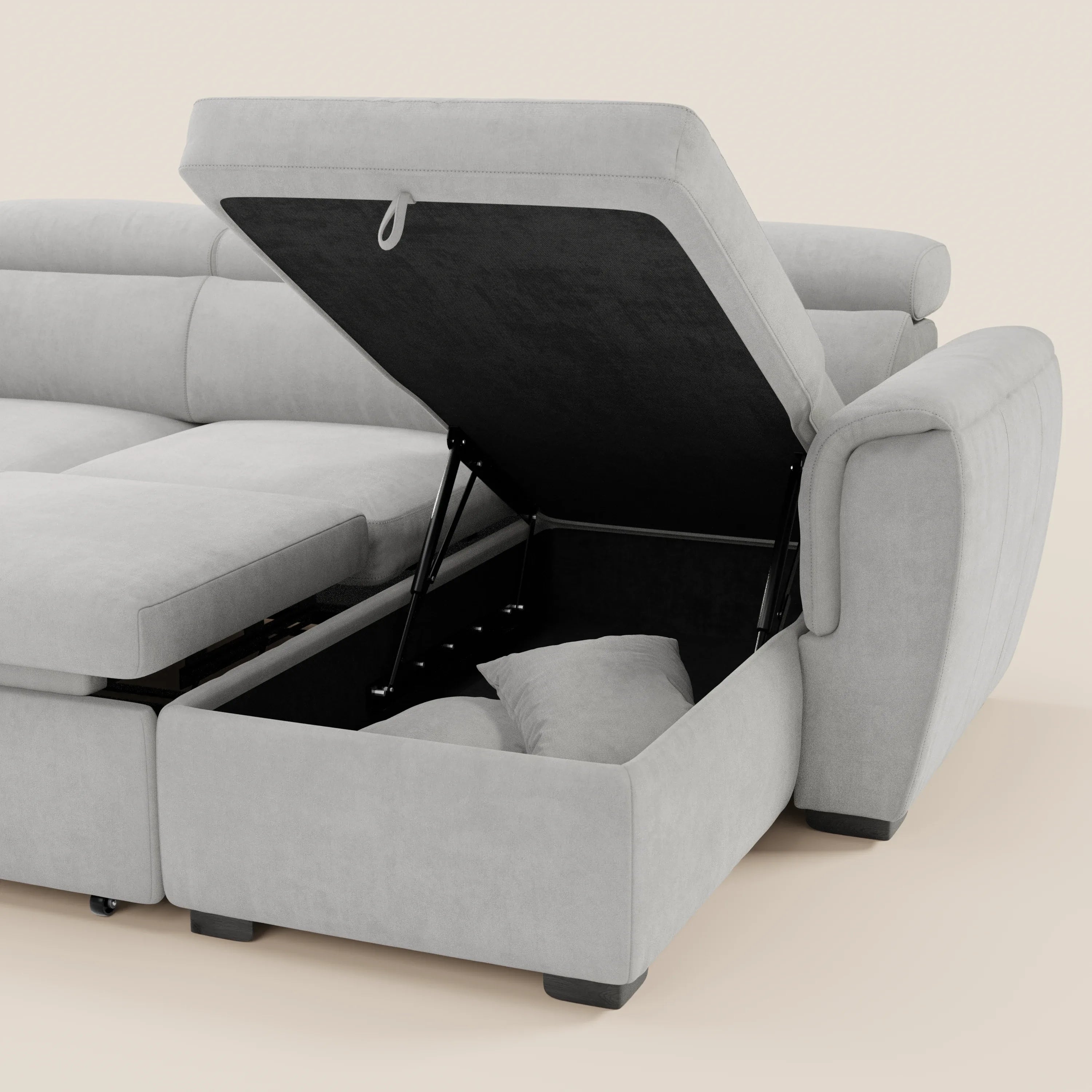 Il divano letto Titano con penisola reversibile di Divani.Store, in tessuto smacchiabile grigio chiaro, è dotato di vano contenitore sotto la seduta, poggiatesta reclinabili e elemento estraibile. Si distingue per le gambe nere e i due cuscini coordinati.