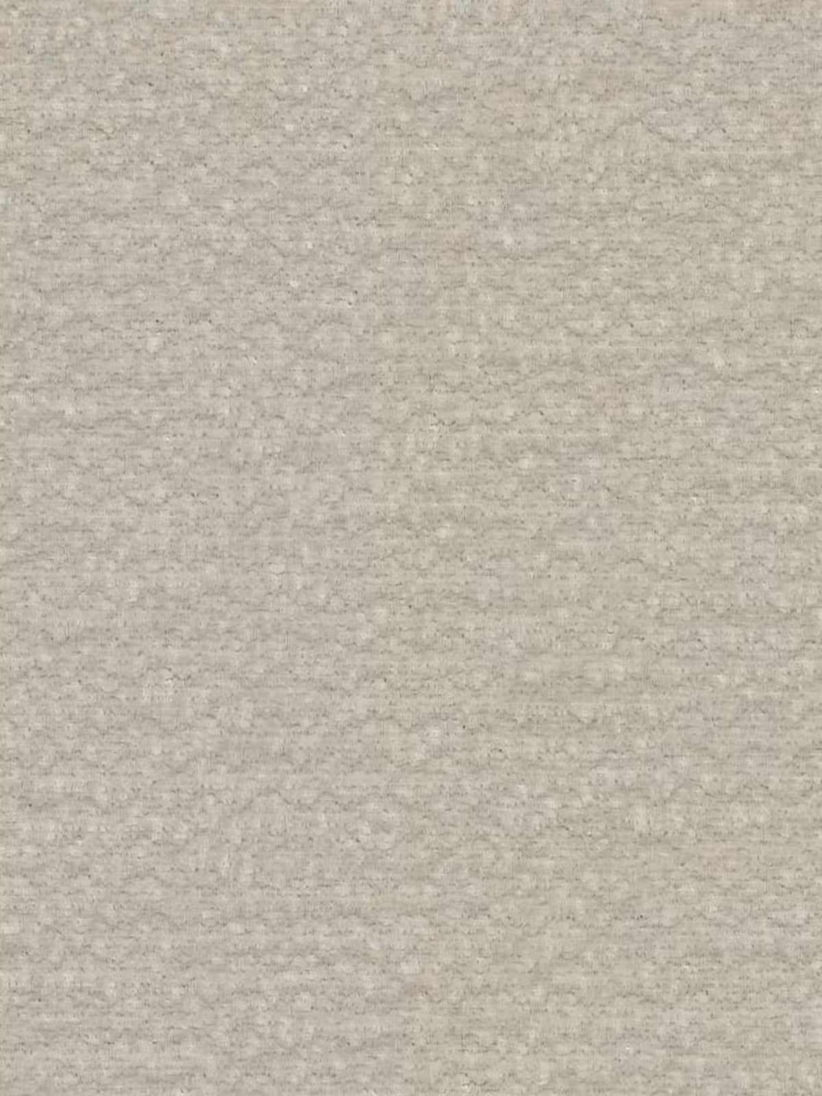 Un primo piano del morbido e uniforme rivestimento color beige chiaro del letto imbottito ARKAM con contenitore e testiera a lavorazione verticale di Letti.store. Il tessuto, certificato Oeko-Tex®, presenta una trama sottile e irregolare con piccole protuberanze e fibre visibili, che creano una superficie tattile caratteristica di questo letto in stile shabby chic.