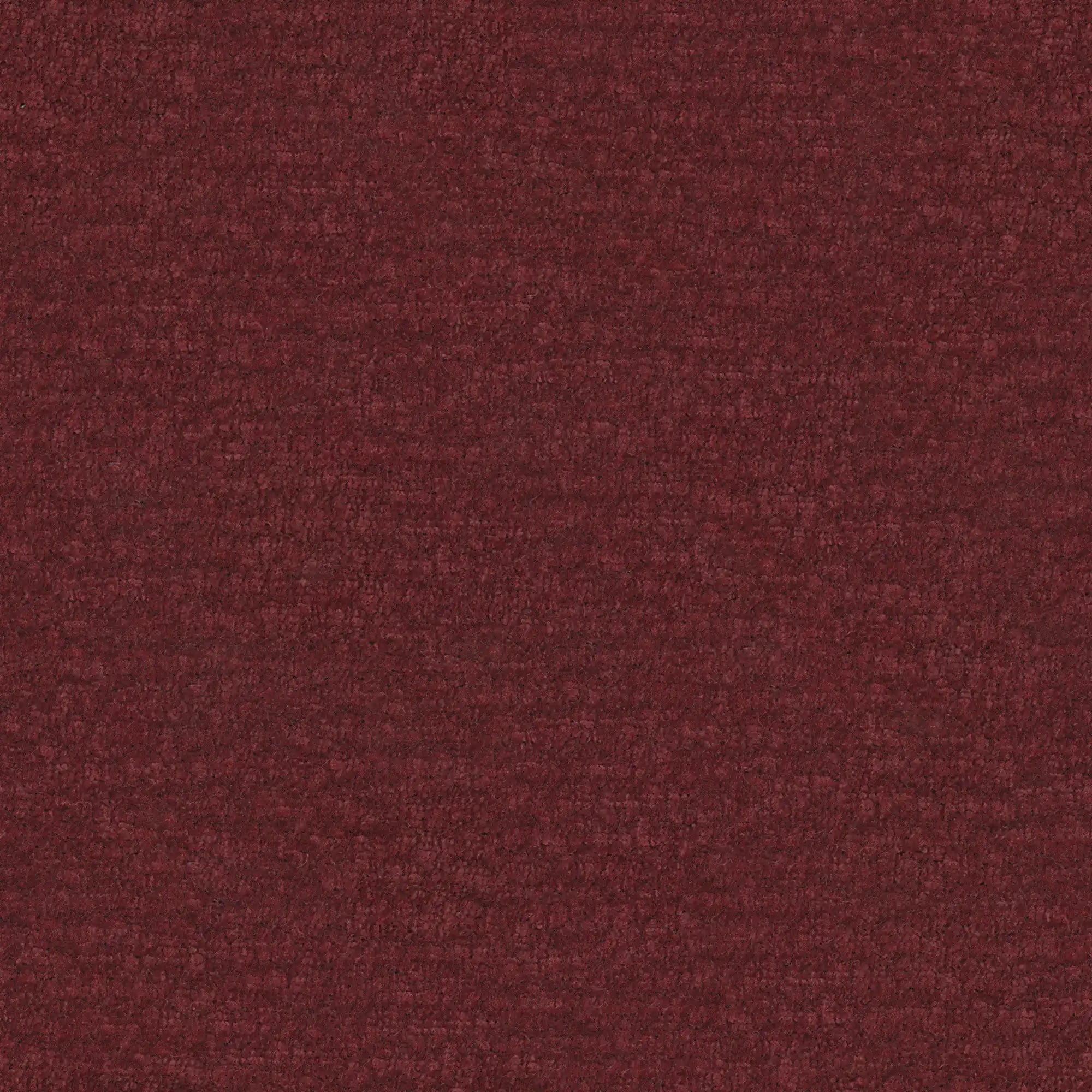 Un primo piano del letto imbottito ONYX di Letti.store mette in risalto il tessuto rosso scuro certificato Oeko-Tex® che riveste la testiera verticale: morbido, leggermente felpato e dalla trama uniforme, esalta la ricca tonalità bordeaux, perfetta per una camera da letto moderna.