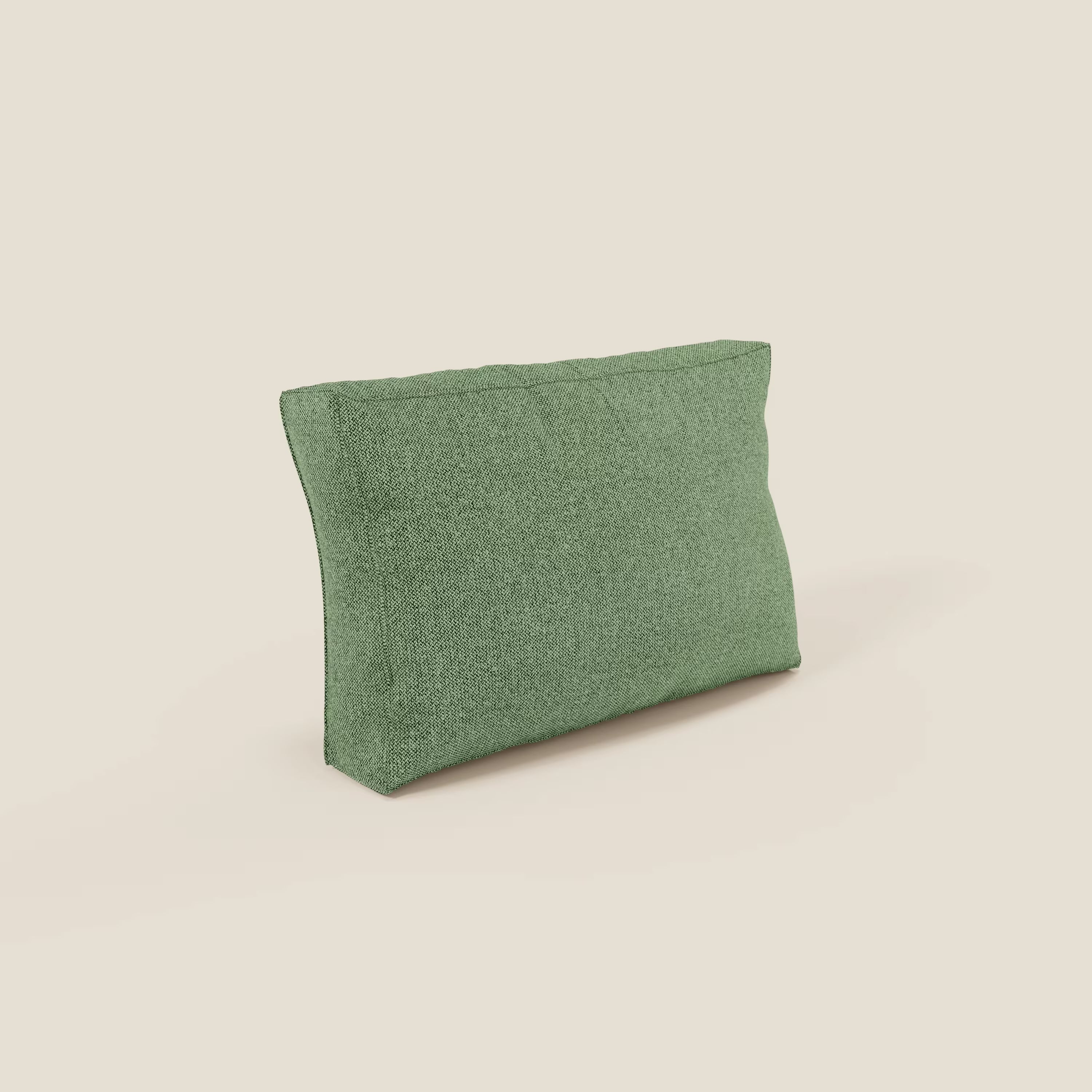 Un cuscino schienale rettangolare BonBon di Divani.Store in tessuto smacchiabile T23 menta si erge su uno sfondo bianco sporco, mostrando il suo design morbido e strutturato e i suoi bordi puliti, ideali per un divano modulare minimalista.