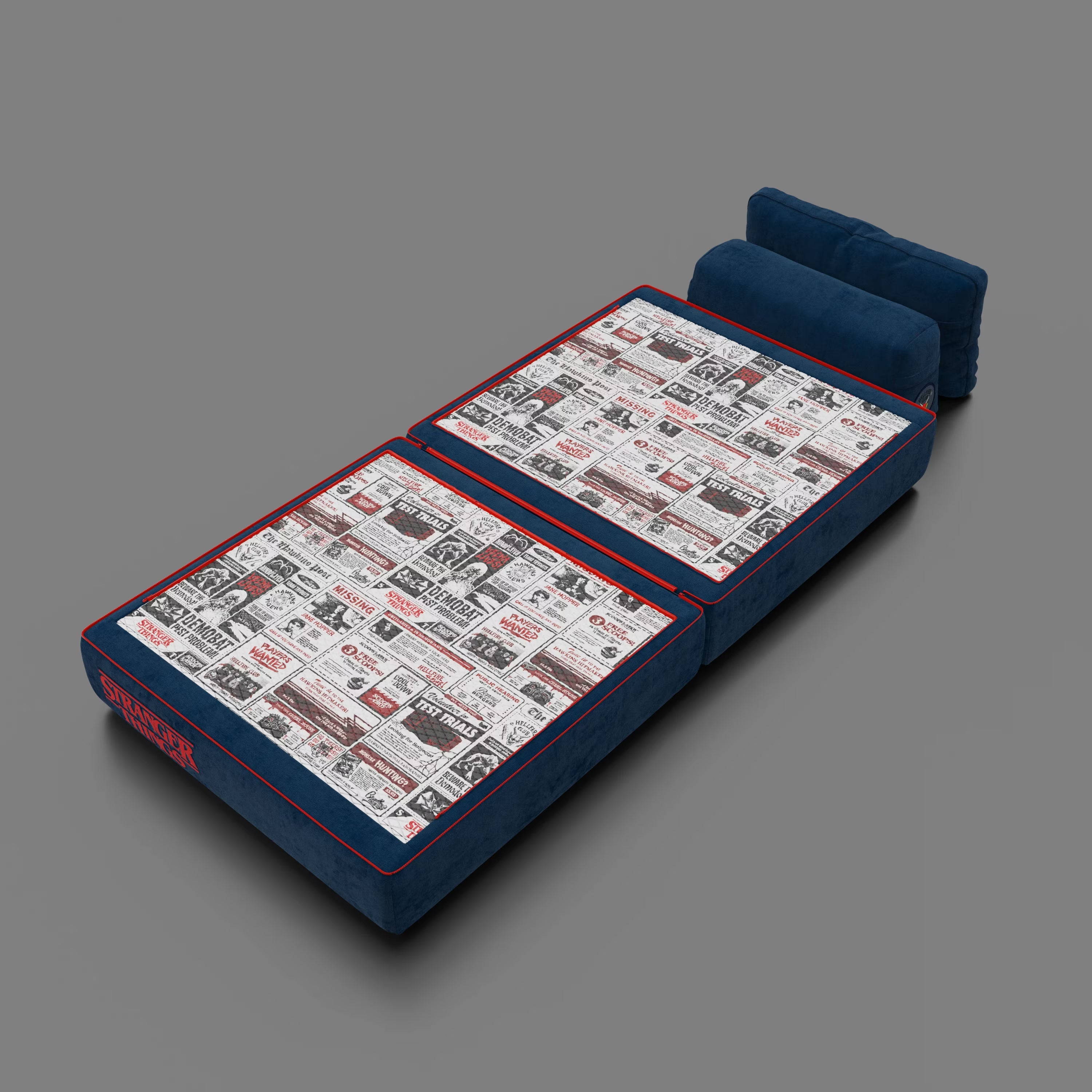 La poltrona letto Rift STRANGER THINGS Edition di Divani.Store è un divano da terra blu, antimacchia, con materasso in memory foam da 22 cm e fumetto d'epoca sulla parte superiore, oltre a due cuscini schienale verticali blu.