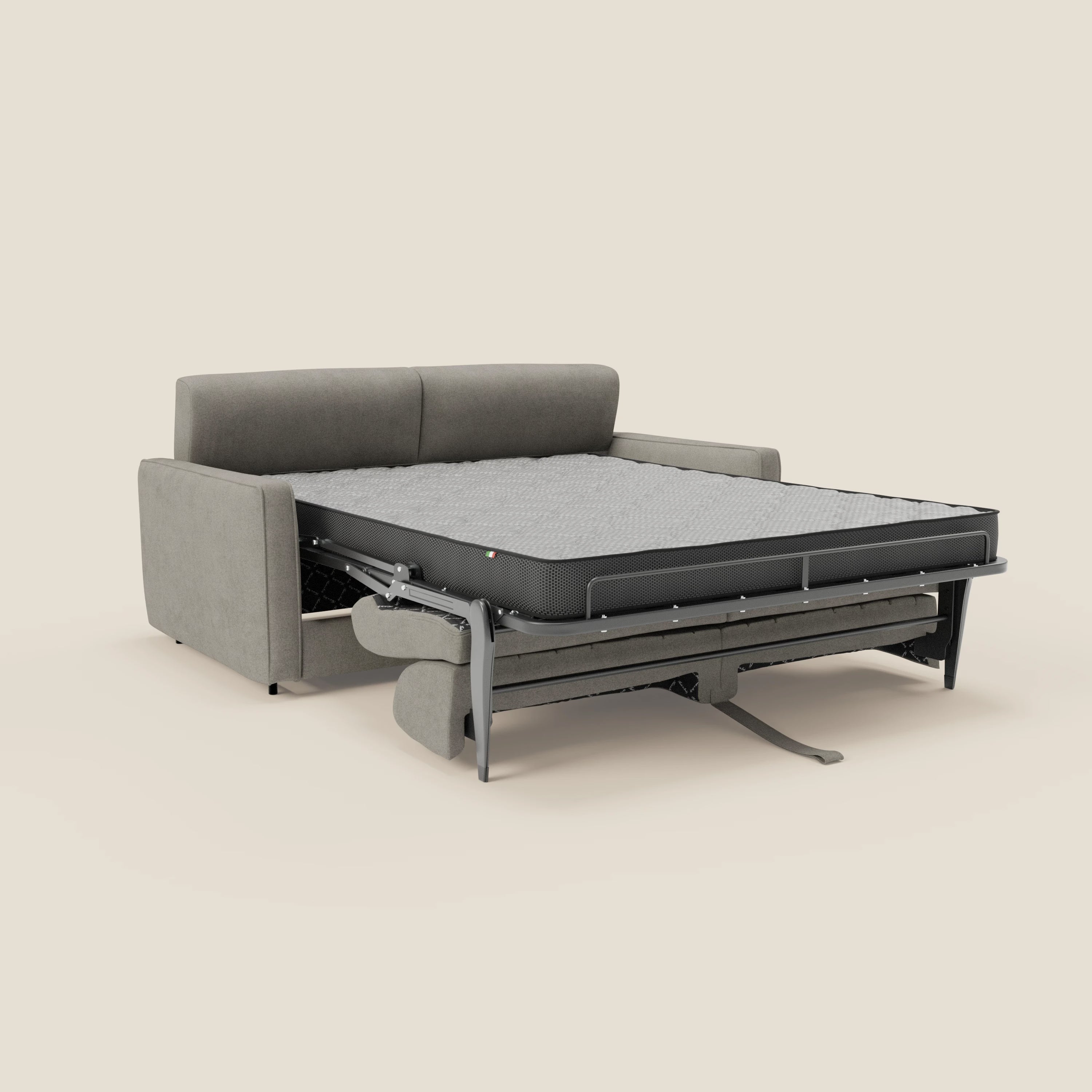 Il Nivon Divano letto moderno di Divani.Store in tessuto impermeabile T25 tortora è caratterizzato da ampi braccioli e da una struttura letto pieghevole in metallo con materasso H16 cm e gambe di sostegno, su uno sfondo beige semplice.