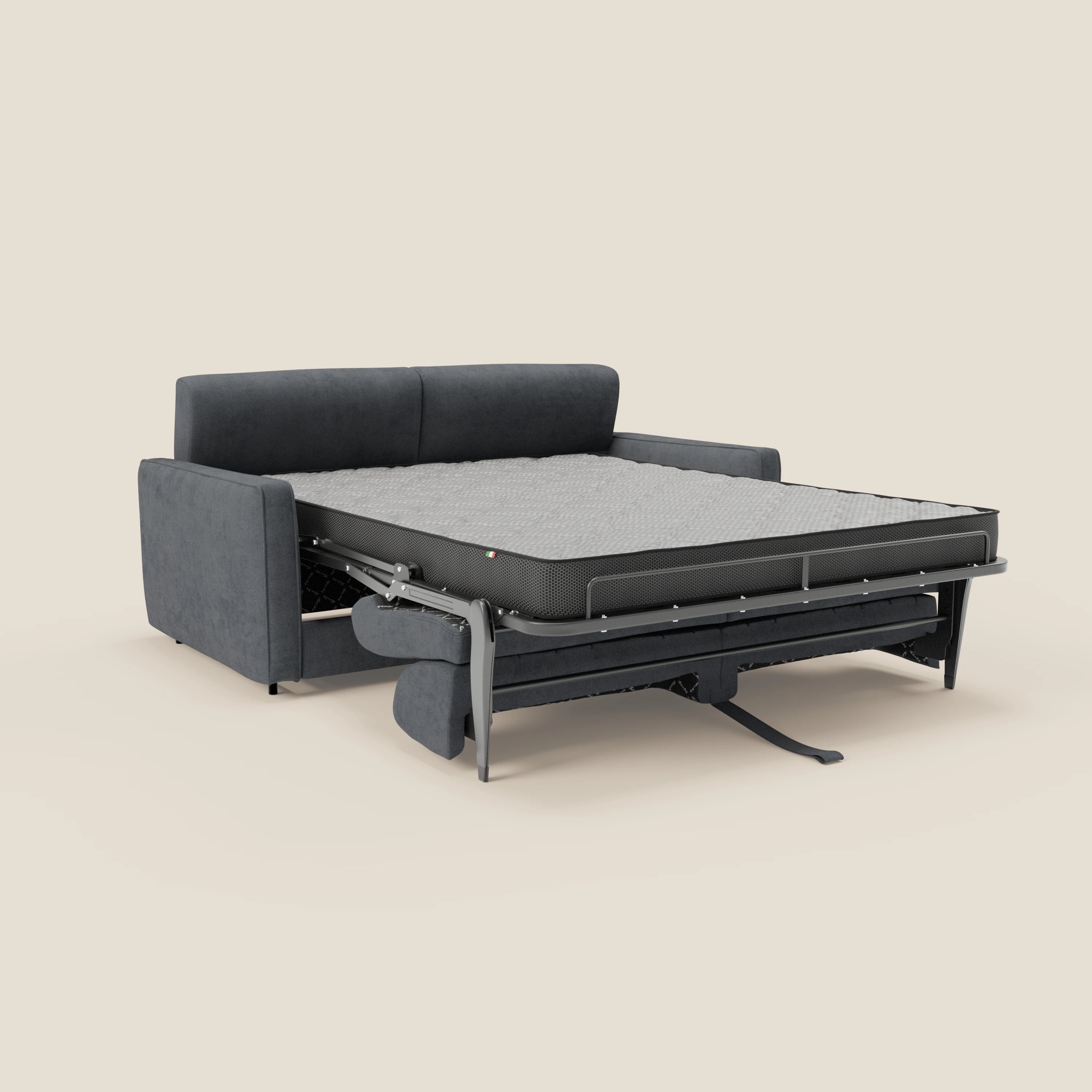 Il Nivon Divano letto moderno di Divani.Store in tessuto impermeabile T25 antracite è caratterizzato da una struttura estraibile in metallo con materasso a tutta altezza H16 cm e poggiatesta regolabile, su uno sfondo tinta unita beige che ne evidenzia il design moderno e la versatilità.